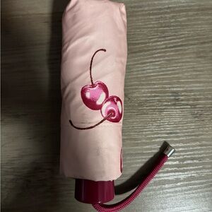 Brand New! Coach Pink Cherry style Umbrella with bag. Perfect gift. I can wrap!